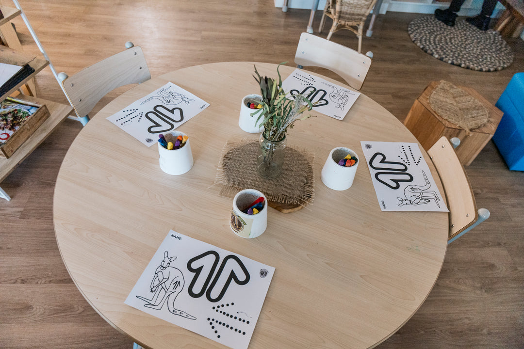 Round table set up for Aboriginal colouring activity 